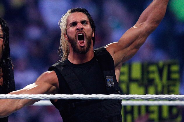 The Shield reacts after their win during Wrestlemania XXX at the Mercedes-Benz Super Dome in New Orleans on Sunday, April 6, 2014. (Jonathan Bachman/AP Images for WWE)