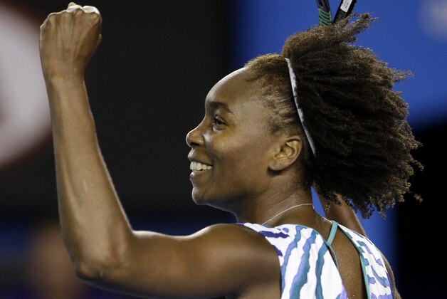 Venus Williams of the U.S. celebrates after winning over Agnieszka Radwanska of Poland in their fourth round match at the Australian Open tennis championship in Melbourne, Australia, Monday, Jan. 26, 2015. (AP Photo/Lee Jin-man)