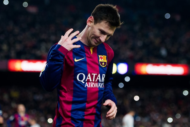BARCELONA, SPAIN - JANUARY 21:  Lionel Messi celebrates after scoring his team's first goal during the Copa del Rey Quarter-Final First Leg match between FC Barcelona and Club Atletico de Madrid at Camp Nou on January 21, 2015 in Barcelona, Spain. (Photo by Alex Caparros/Getty Images)