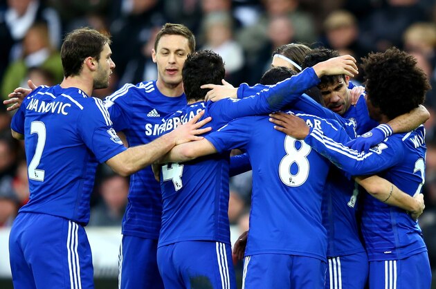SWANSEA, WALES - JANUARY 17:  Diego Costa of Chelsea celebrates with team-mates after scoring his team's second goal during the Barclays Premier League match between Swansea City and Chelsea at Liberty Stadium on January 17, 2015 in Swansea, Wales.  (Photo by Richard Heathcote/Getty Images)