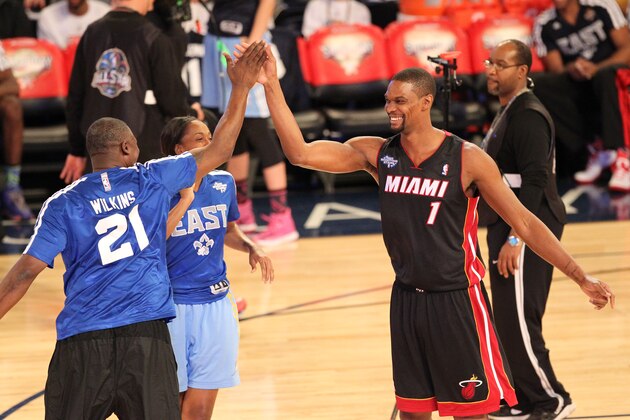 NEW ORLEANS, LA - FEBRUARY 15: Chris Bosh #1 and Dominique Wilkins #21 of the East Team celebrate during the Sears Shooting Stars Competition on State Farm All-Star Saturday Night as part of the 2014 All-Star Weekend at Smoothie King Center on February 15, 2014 in New Orleans, Louisiana. NOTE TO USER: User expressly acknowledges and agrees that, by downloading and/or using this photograph, user is consenting to the terms and conditions of the Getty Images License Agreement.  Mandatory Copyright Notice: Copyright 2014 NBAE (Photo by Bruce Yeung/NBAE via Getty Images)