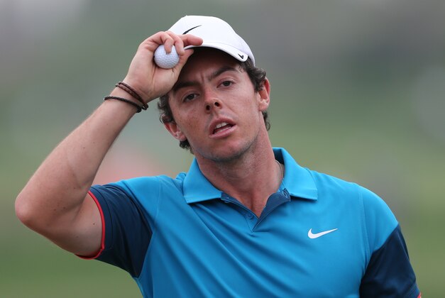 Rory McIlroy of Northern Ireland reacts on the hole 18th after he lost the final round of the Abu Dhabi HSBC Golf Championship in Abu Dhabi, United Arab Emirates, Sunday, Jan. 18, 2015. Gary Stal of France went on to win the championship. (AP Photo/Kamran Jebreili)