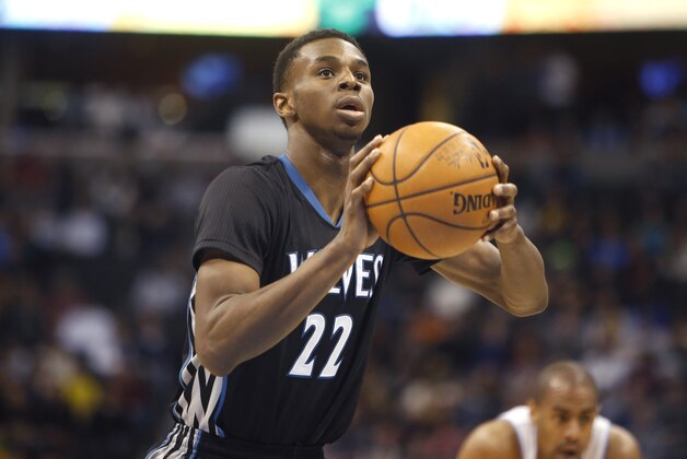 Jan 17, 2015; Denver, CO, USA; Minnesota Timberwolves forward Andrew Wiggins (22) shoots a free throw during the second half against the Denver Nuggets at Pepsi Center. The Timberwolves won 113-105. Mandatory Credit: Chris Humphreys-USA TODAY Sports