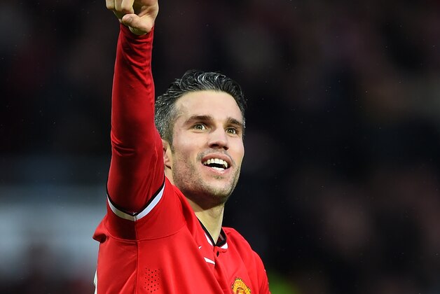 MANCHESTER, ENGLAND - DECEMBER 14:  Robin van Persie of Manchester United celebrates scoring the third goal during the Barclays Premier League match between Manchester United and Liverpool at Old Trafford on December 14, 2014 in Manchester, England.  (Photo by Shaun Botterill/Getty Images)