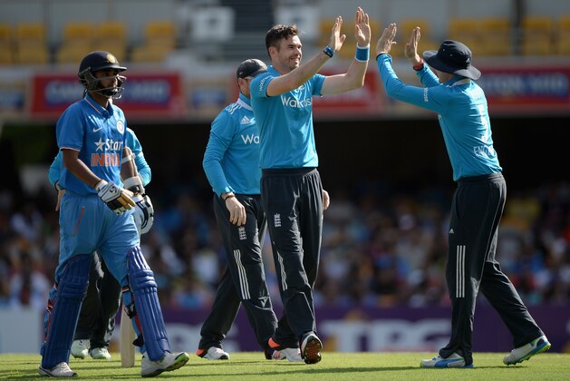 BRISBANE, AUSTRALIA - JANUARY 20:  James Anderson of England celebrates with Joe Root after dismissing Bhuvneshwar Kumar of India during the One Day International match between England and India at The Gabba on January 20, 2015 in Brisbane, Australia.  (Photo by Gareth Copley/Getty Images)