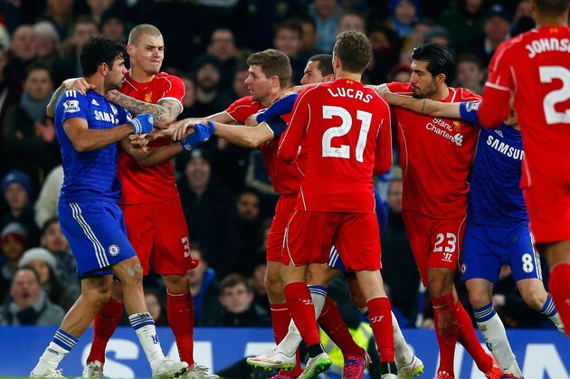 LONDON, ENGLAND - JANUARY 27:  Diego Costa of Chelsea clashes with Martin Skrtel, Steven Gerrard and Emre Can of Liverpool during the Capital One Cup Semi-Final second leg between Chelsea and Liverpool at Stamford Bridge on January 27, 2015 in London, England.  (Photo by Julian Finney/Getty Images)