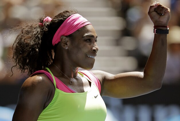 Serena Williams of the U.S. celebrates after defeating Dominika Cibulkova of Slovakia in   their quarterfinal match at the Australian Open tennis championship in Melbourne, Australia, Wednesday, Jan. 28, 2015. (AP Photo/Bernat Armangue)