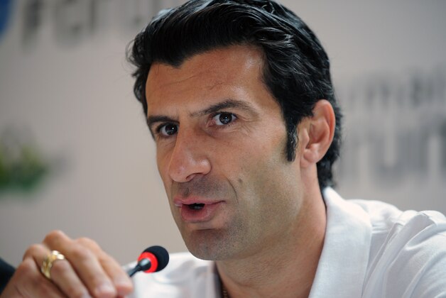 Retired Portugese soccer star Luis Figo speaks with journalists and young Turkish soccer players in Istanbul, Turkey, Thursday, Sept. 22, 2011. Figo is in Istanbul to select 10 young Turkish soccer players to join the junior team of Italy's Inter Milan.(AP Photo)