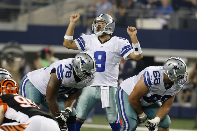 Dallas Cowboys' Tony Romo (9) signals at the line of scrimmage as tackle Jermey Parnell (78) and tackle Doug Free (68) provide protection during the first half of a preseason NFL football game against the Cincinnati Bengals, Saturday, Aug. 24, 2013, in Arlington, Texas. (AP Photo/Sharon Ellman)