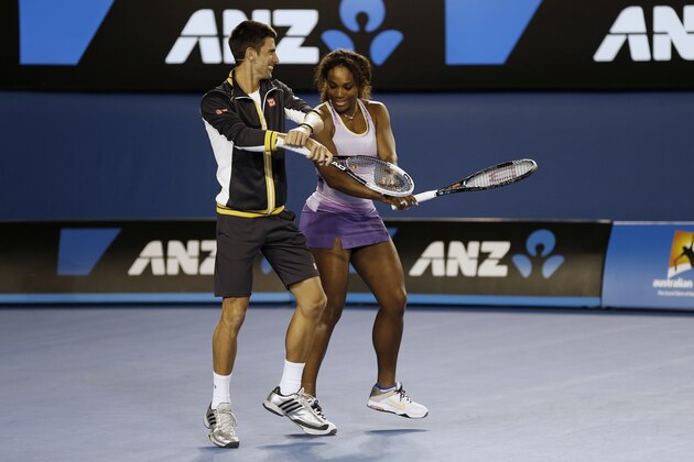 Serbia's Novak Djokovic and Serena Williams of the US perform the gangnam style dance during the Kids Tennis Day at Melbourne Park ahead of the Australian Open tennis championship in Melbourne, Australia, Saturday, Jan. 12, 2013. (AP Photo/Andy Wong)