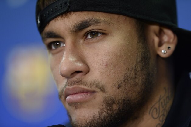 FC Barcelona's Neymar from Brazil attends a commercial event at the Sports Center FC Barcelona Joan Gamper in San Joan Despi, Spain, Monday, Jan. 26, 2015. (AP Photo/Manu Fernandez)