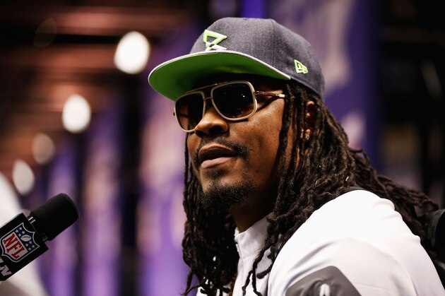PHOENIX, AZ - JANUARY 27:  Marshawn Lynch #24 of the Seattle Seahawks addresses the media at Super Bowl XLIX Media Day Fueled by Gatorade inside U.S. Airways Center on January 27, 2015 in Phoenix, Arizona.  (Photo by Christian Petersen/Getty Images)