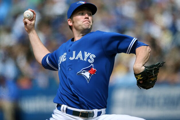 TORONTO, CANADA - JUNE 8: Casey Janssen #44 of the Toronto Blue Jays delivers a pitch during MLB game action against the Texas Rangers on June 8, 2013 at Rogers Centre in Toronto, Ontario, Canada. (Photo by Tom Szczerbowski/Getty Images)