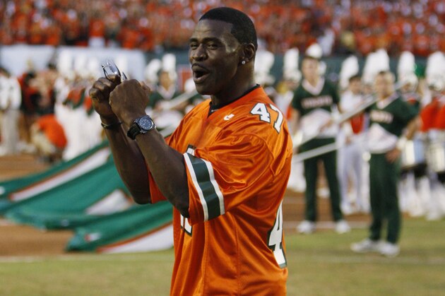 Former Miami wide receiver Michael Irvin is introduced before an NCAA college football game between Miami and Florida A&M, Thursday, Sept. 2, 2010, in Miami. (AP Photo/Wilfredo Lee)