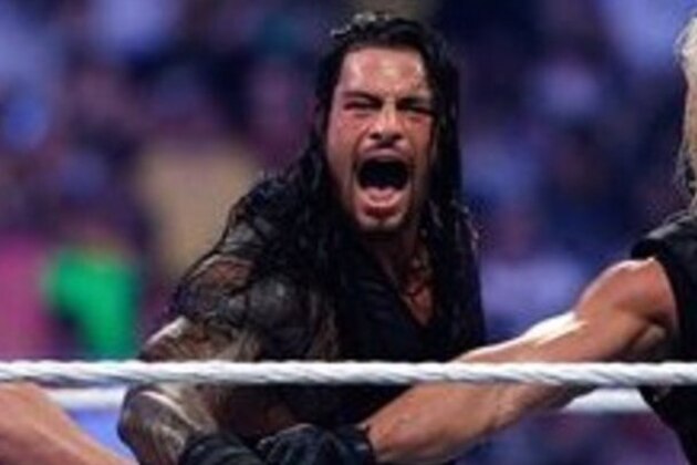 The Shield reacts after their win during Wrestlemania XXX at the Mercedes-Benz Super Dome in New Orleans on Sunday, April 6, 2014. (Jonathan Bachman/AP Images for WWE)