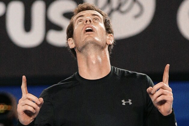 Andy Murray of Britain celebrates after defeating Nick Kyrgios of Australia in their quarterfinal match at the Australian Open tennis championship in Melbourne, Australia, Tuesday, Jan. 27, 2015. (AP Photo/Rob Griffith)