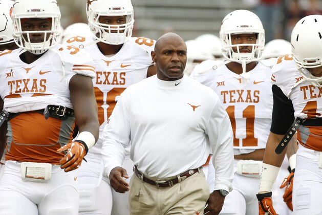 Oct 11, 2014; Dallas, TX, USA; Texas Longhorns head coach Charlie Strong takes the field with his team before the game against the Oklahoma Sooners at the Cotton Bowl. Mandatory Credit: Tim Heitman-USA TODAY Sports