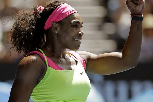 Serena Williams of the U.S. celebrates after defeating Dominika Cibulkova of Slovakia in   their quarterfinal match at the Australian Open tennis championship in Melbourne, Australia, Wednesday, Jan. 28, 2015. (AP Photo/Bernat Armangue)