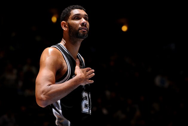 DENVER, CO - January 20: Tim Duncan #21 of the San Antonio Spurs stands on the court during a game against the Denver Nuggets on January 20, 2015 at the Pepsi Center in Denver, Colorado. NOTE TO USER: User expressly acknowledges and agrees that, by downloading and/or using this Photograph, user is consenting to the terms and conditions of the Getty Images License Agreement. Mandatory Copyright Notice: Copyright 2015 NBAE (Photo by Bart Young/NBAE via Getty Images)