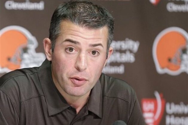 CORRECTS TO DEFILIPPO NOT DIFILIPPO - Cleveland Browns offensive coordinator John DeFilippo answers questions at the NFL football team's facility in Berea, Ohio, Thursday, Jan. 22, 2015. As Cleveland's new offensive coordinator, he will take on the biggest challenge of his career with the Browns, who once again have a mess at quarterback. (AP Photo/Mark Duncan)