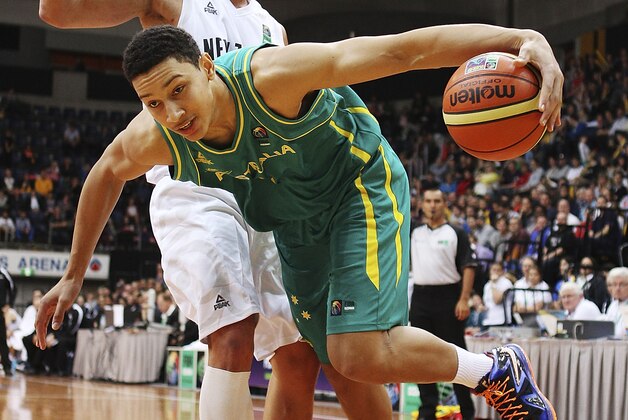 CANBERRA, AUSTRALIA - AUGUST 18:  Ben Simmons of the Boomers drives the ball to the basket during the Men's FIBA Oceania Championship match between the Australian Boomers and the New Zealand Tall Blacks at AIS on August 18, 2013 in Canberra, Australia.  (Photo by Stefan Postles/Getty Images)