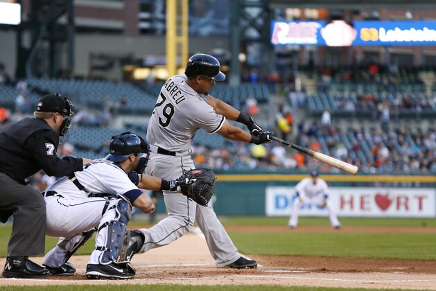 Chicago White Sox's Jose Abreu bats against the Detroit Tigers in the first inning of a baseball game in Detroit Monday, Sept. 22, 2014. (AP Photo/Paul Sancya)