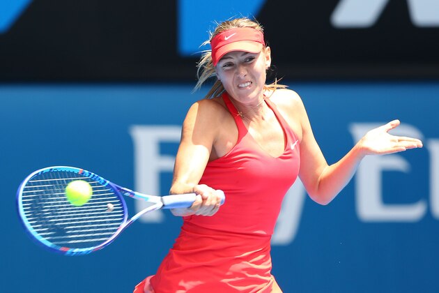MELBOURNE, AUSTRALIA - JANUARY 29:  Maria Sharapova of Russia plays a forehand in her semifinal match against Ekaterina Makarova of Russia during day 11 of the 2015 Australian Open at Melbourne Park on January 29, 2015 in Melbourne, Australia.  (Photo by Quinn Rooney/Getty Images)