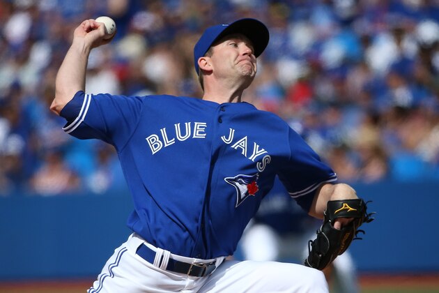 TORONTO, CANADA - MAY 25: Casey Janssen #44 of the Toronto Blue Jays delivers a pitch in the ninth inning during MLB game action against the Oakland Athletics on May 25, 2014 at Rogers Centre in Toronto, Ontario, Canada. (Photo by Tom Szczerbowski/Getty Images)