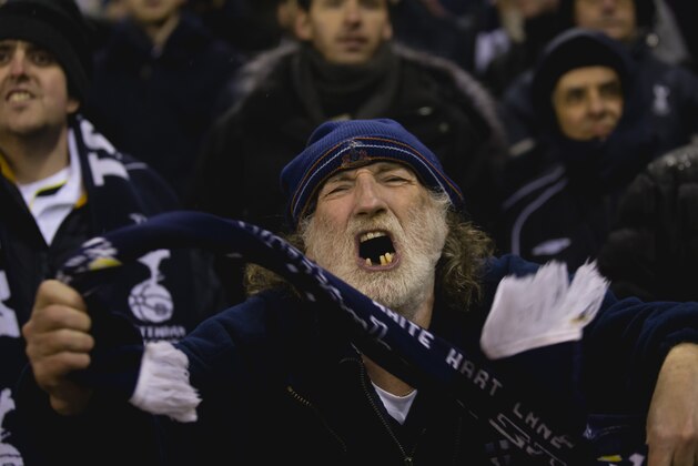 A Tottenham supporter celebrates after his team's English League Cup Semi-Final victory over Sheffield United at Bramall Lane Stadium, Sheffield, England, Wednesday, Jan. 28, 2015. (AP Photo/Jon Super)