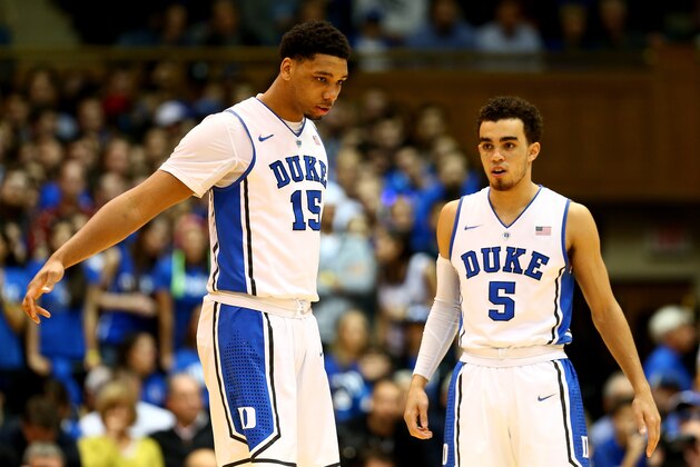 DURHAM, NC - JANUARY 19:  Tyus Jones #5 and Jahlil Okafor #15 of the Duke Blue Devils during their game against the Pittsburgh Panthers at Cameron Indoor Stadium on January 19, 2015 in Durham, North Carolina.  (Photo by Streeter Lecka/Getty Images)