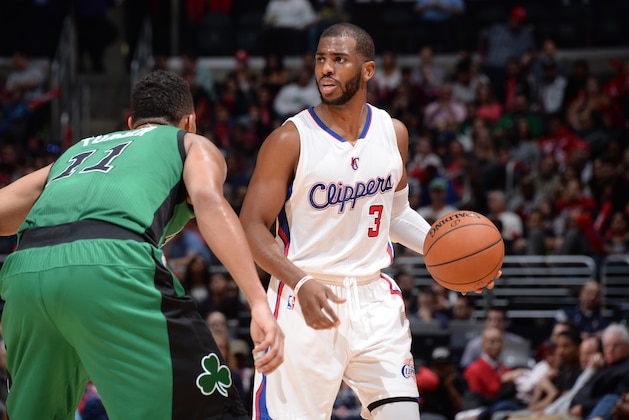 LOS ANGELES, CA - JANUARY 19:  Chris Paul #3 of the Los Angeles Clippers handles the ball against the Boston Celtics during the game on January 19, 2015 at STAPLES Center in Los Angeles, California. NOTE TO USER: User expressly acknowledges and agrees that, by downloading and/or using this Photograph, user is consenting to the terms and conditions of the Getty Images License Agreement. Mandatory Copyright Notice: Copyright 2015 NBAE (Photo by Andrew D. Bernstein/NBAE via Getty Images)