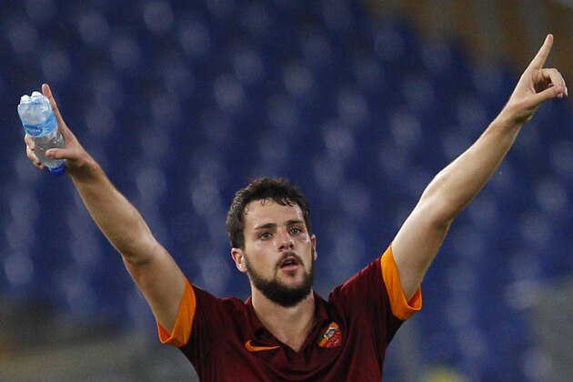Roma’s Mattia Destro celebrates after scoring during a Serie A soccer match between Roma and Hellas Verona, at Rome's Olympic stadium, Saturday, Sept. 27, 2014. (AP Photo/Riccardo De Luca)