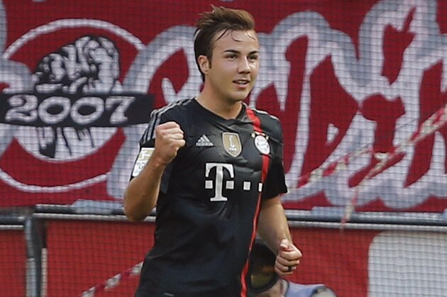 Bayern's Mario Goetze celebrates after scoring during the German first division Bundesliga soccer match between FC Cologne and Bayern Munich in Cologne, Germany, Saturday, Sept. 27, 2014. (AP Photo/Frank Augstein)