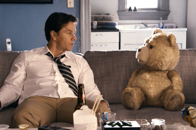 This film image released by Universal Pictures shows Mark Wahlberg, left with the character Ted, voiced by Seth MacFarlane in a scene from