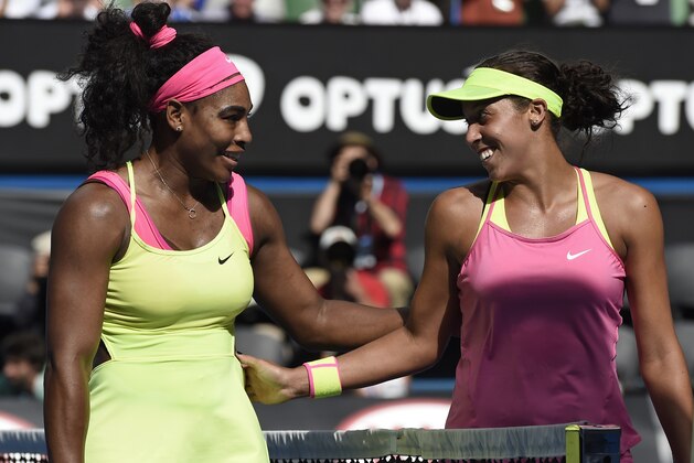 Serena Williams of the U.S., left,  is congratulated by her compatriot Madison Keys after winning their semifinal match at the Australian Open tennis championship in Melbourne, Australia, Thursday, Jan. 29, 2015. (AP Photo/Andy Brownbill)