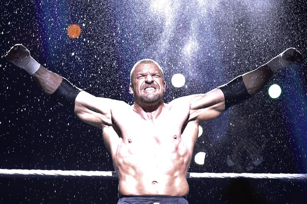 Triple H enters the ring during Wrestlemania XXX at the Mercedes-Benz Super Dome in New Orleans on Sunday, April 6, 2014. (Jonathan Bachman/AP Images for WWE)