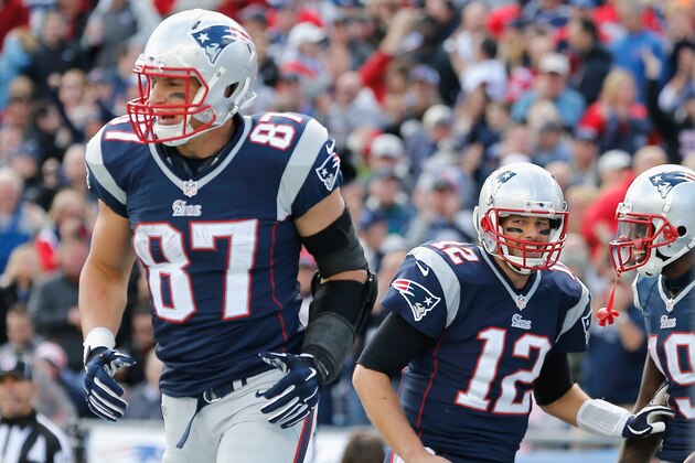 FOXBORO, MA - OCTOBER 26:  Rob Gronkowski #87, Tom Brady #12, and Brandon LaFell#19 of the New England Patriots react after LaFell caught a touchdown pass during the second quarter against the Chicago Bears at Gillette Stadium on October 26, 2014 in Foxboro, Massachusetts.  (Photo by Jim Rogash/Getty Images)