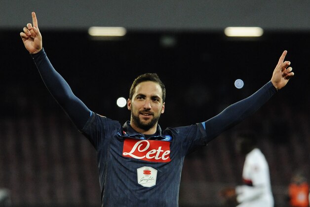 Napoli's Gonzalo Higuain celebrates after scoring his second goal on a penalty kick during a Serie A soccer match between Napoli and Genoa, at the San Paolo stadium in Naples, Italy, Monday, Jan. 26, 2015. (AP Photo/Salvatore Laporta)