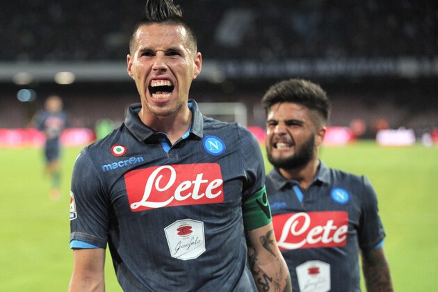Napoli's Marek Hamsik celebrates after scoring during a Serie A soccer match between Napoli and Torino, at the San Paolo stadium in Naples, Italy, Sunday, Oct. 26, 2014. (AP Photo/Franco Castano')