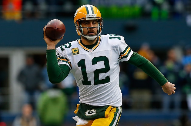 SEATTLE, WA - JANUARY 18: Aaron Rodgers #12 of the Green Bay Packers passes the ball during the second half of the 2015 NFC Championship game against the Seattle Seahawks at CenturyLink Field on January 18, 2015 in Seattle, Washington.  (Photo by Tom Pennington/Getty Images)