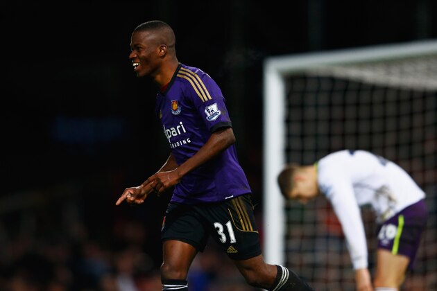 LONDON, ENGLAND - JANUARY 13:  Despair for John Stones of Everton (R) as Enner Valencia of West Ham United celebrates as he scores their first goal during the FA Cup Third Round Replay match between West Ham United and Everton at Boleyn Ground on January 13, 2015 in London, England.  (Photo by Julian Finney/Getty Images)