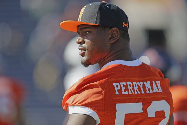 Miami inside linebacker Denzel Perryman (52) sits out on the sideline during NCAA college football practice for the Senior Bowl, Wednesday, Jan. 21, 2015, at Ladd-Peebles Stadium in Mobile, Ala. (AP Photo/Brynn Anderson)