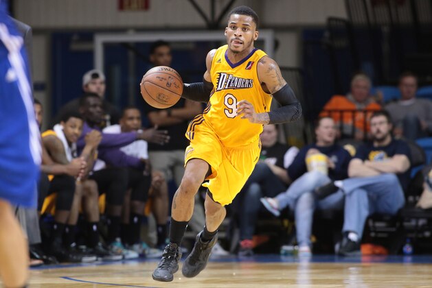 SANTA CRUZ - JANUARY 18: Vander Blue #9 of the Los Angeles D-Fenders dribbles the ball against the Delaware 87ers of the  during the 2015 NBA D-League Showcase presented by SAMSUNG on January 18, 2015 at Kaiser Permanente Arena in Santa Cruz, California. NOTE TO USER: User expressly acknowledges and agrees that, by downloading and/or using this Photograph, user is consenting to the terms and conditions of the Getty Images License Agreement. Mandatory Copyright Notice: Copyright 2015 NBAE (Photo by Jack Arent/NBAE via Getty Images)