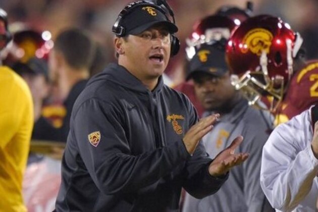 Southern California coach Steve Sarkisian claps during the second half of an NCAA college football game against California, Thursday, Nov. 13, 2014, in Los Angeles. USC won 38-30. (AP Photo/Mark J. Terrill)