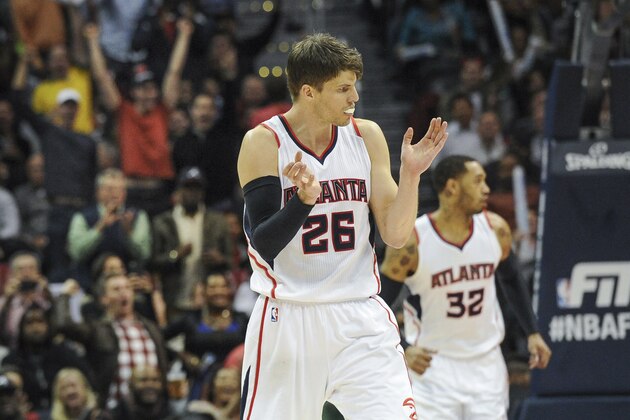 Atlanta Hawks guard Kyle Korver (26) celebrates a 3-point shot against the Brooklyn Nets during the second half of an NBA basketball game, Wednesday Jan. 28, 2015, in Atlanta. Atlanta won 113-102. (AP Photo/John Amis)