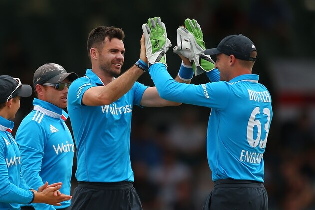 PERTH, AUSTRALIA - JANUARY 30:  James Anderson and Jos Buttler of England celebrate the dismissal of MS Dhoni of India during the One Day International match between England and India at WACA on January 30, 2015 in Perth, Australia.  (Photo by Paul Kane/Getty Images)