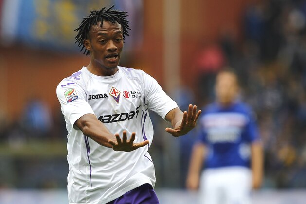 GENOA, ITALY - APRIL 28:  Juan Cuadrado of ACF Fiorentina celebrates after scoring the opening goal during the Serie A match between UC Sampdoria and ACF Fiorentina at Stadio Luigi Ferraris on April 28, 2013 in Genoa, Italy.  (Photo by Marco Luzzani/Getty Images)