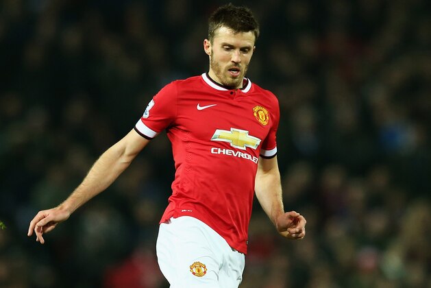 MANCHESTER, ENGLAND - NOVEMBER 29: Michael Carrick of Manchester United in action during the Barclays Premier League match between Manchester United and Hull City at Old Trafford on November 29, 2014 in Manchester, England. (Photo by Matthew Lewis/Getty Images) MANCHESTER, ENGLAND - NOVEMBER 29: Michael Carrick of Manchester United in action during the Barclays Premier League match between Manchester United and Hull City at Old Trafford on November 29, 2014 in Manchester, England. (Photo by Matthew Lewis/Getty Images)