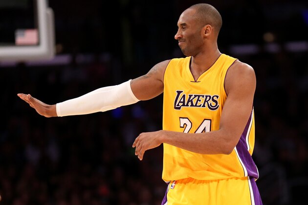 LOS ANGELES, CA - JANUARY 13:  Kobe Bryant #24 of the Los Angeles Lakers reacts in the game against the Miami Heat at Staples Center on January 13, 2015 in Los Angeles, California. The Heat won 78-75.   NOTE TO USER: User expressly acknowledges and agrees that, by downloading and or using this photograph, User is consenting to the terms and conditions of the Getty Images License Agreement.  (Photo by Stephen Dunn/Getty Images)