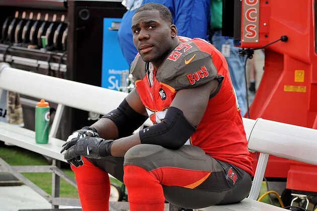 TAMPA, FL - NOVEMBER 09: Demar Dotson #69 of the Tampa Bay Buccaneers looks on during the second half of the game against the Atlanta Falcons at Raymond James Stadium on November 9, 2014 in Tampa, Florida. (Photo by Cliff McBride/Getty Images)